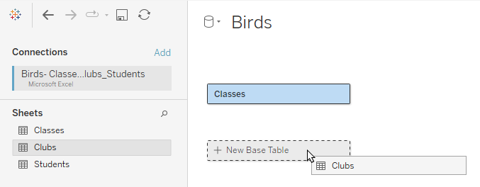 el lienzo de modelado de datos con una tabla base existente y un área de colocación para Nueva tabla base