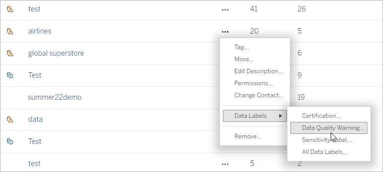 Menú desplegable de Etiquetas de datos con el cursor seleccionando "Advertencia de calidad de los datos..."